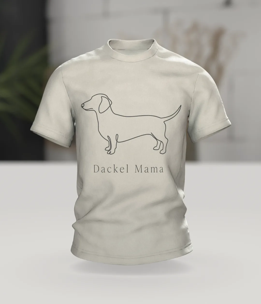 Dackel Mama T-Shirt, minimalistische Dackel Linienkunst mit Schriftzug auf dem Rücken, Im Raum