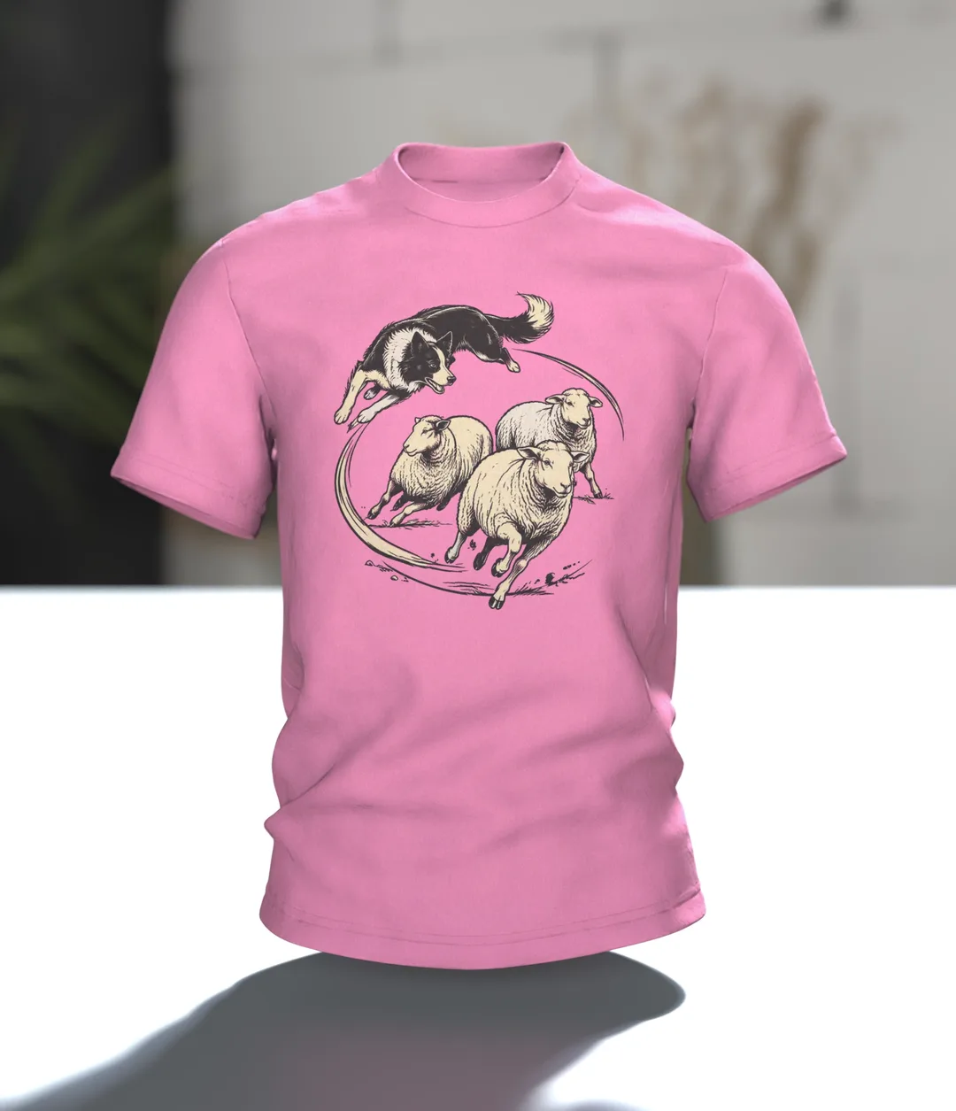 Border Collie Shirt: Collie Leaping Over Sheep on Front, Resting Flock by Wooden Fence on Back, Woodcut Style, In context