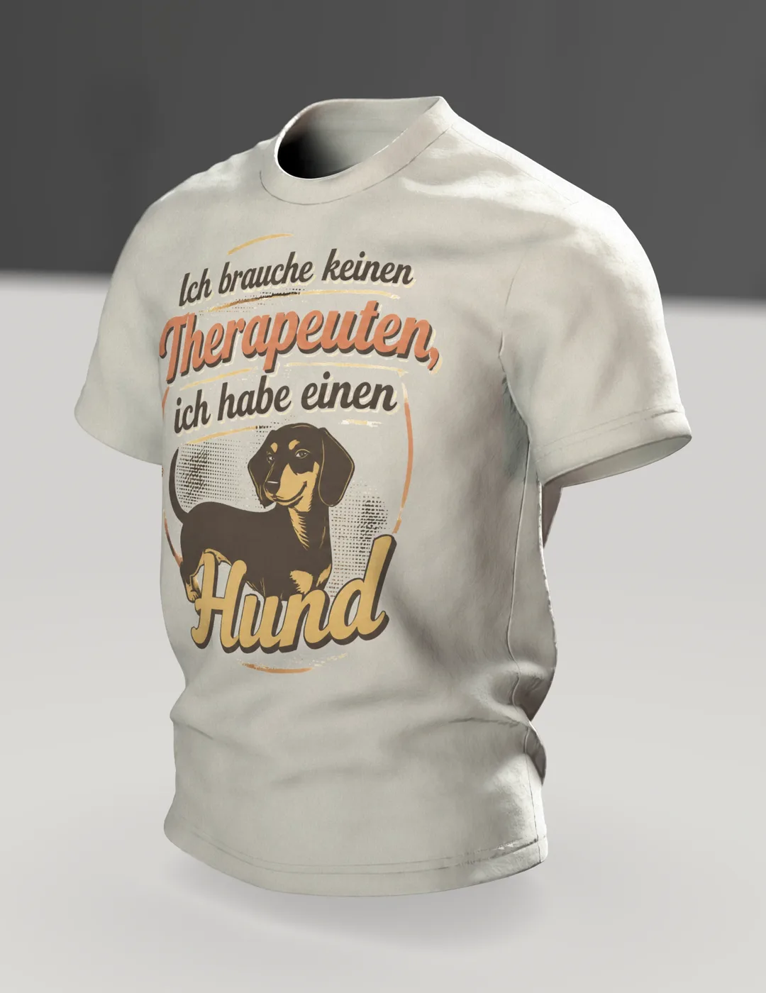 Hunde Spruch T-Shirt: „Ich brauche keinen Therapeuten, ich habe einen Hund“, Dackel im Retro-Schriftbild, hinten Dackelkopf, Im Raum, schräg