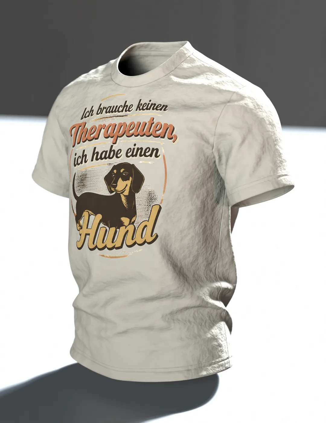 Hunde Spruch T-Shirt: „Ich brauche keinen Therapeuten, ich habe einen Hund“, Dackel im Retro-Schriftbild, hinten Dackelkopf, Im Raum, schräg